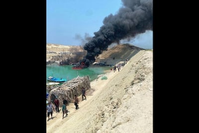 Video posted on social media shows burning fishing boats at Banood pier in Iran's southern Bushehr province. AFP