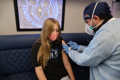 A child receives a meningitis vaccine in California. Bacterial meningitis can attack the brain and spinal cord. Reuters