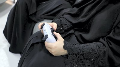 Female gamers can practice their PlayStation gaming skills at sQuad Core. Wajod Alkhamis / The National