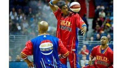 A reader is looking forward to seeing the Harlem Globetrotters, but hopes they lose for once. Nicholas Kamm / AFP