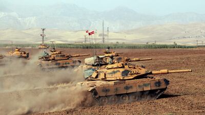 Turkish army tanks are used in drills in Silopi, near the Habur border crossing with Iraq’s autonomous Kurdish region, in 2017. AP