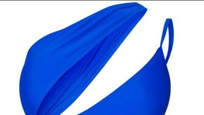 In eye-catching and oh-so summery cobalt blue, this asymmetric swimsuit comes with double strap detailing; Dh74, prettylittlething.com. Photo: Pretty Little Thing