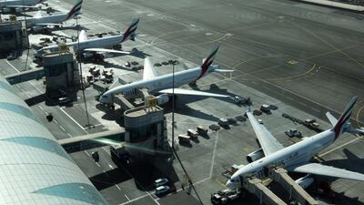 Dubai International Airport, above, and Al Maktoum International Airport will need to handle 146 million passengers by 2025. Stephen Lock / The National