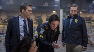 Kevin Bacon, left, Mark Wahlberg and John Goodman appear in a scene from Patriots Day. Karen Ballard / CBS Films and Lionsgate Films via AP