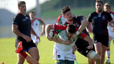 Dubai Exiles, in black, were in good shape during their big win over Muscat at The Sevens in Dubai. Ravindranath K / The National