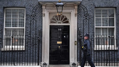 Some argue that there are more doors in the world, such as the famous one on 10 Downing Street, the official residence of Britain's prime minister, in London. AFP