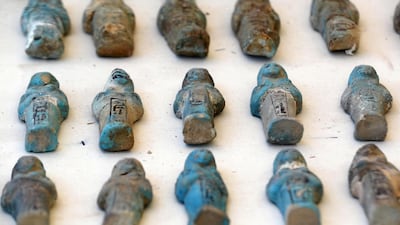 Statues are displayed outside a newly discovered pharaonic tomb "Shedsu Djehuty" in Luxor, Egypt. REUTERS