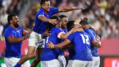Samoa players celebrate their third try scored by Ed Fidow. Reuters