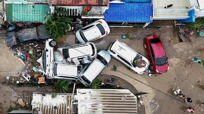 Damaged cars in Cebu city. AP