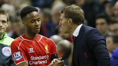 Liverpool's Raheem Sterling shakes manager Brendan Rodgers's hand after being substituted during the team's Premier League win over Newcastle United on Monday night. Lee Smith / Action Images / Reuters / April 13, 2015