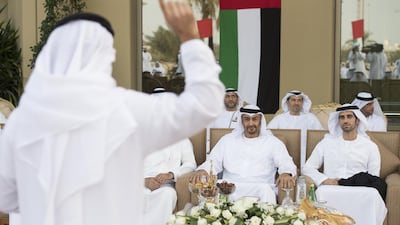 Sheikh Mohammed bin Zayed at the wedding reception of Faisal Al Hammadi, right. Hamad Al Kaabi / Crown Prince Court - Abu Dhabi