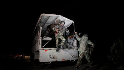 Pakistani troops deploy outside the police training centre in the northern city of Quetta on October 25, 2016 following an attack on the building. Naseer Ahmed / Reuters