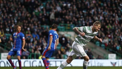 John Guidetti, right, and his Celtic teammates have won eight in a row but hold only a six-point lead in Scotland. Russell Cheyne / Reuters
