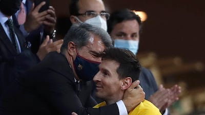 Lionel Messi with Barcelona president Joan Laporta after winning the Copa del Rey. AP
