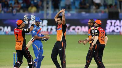 Sunrisers' Naman Ojha, left, provided a little cameo Saturday to lift his team to an eight-wicket win over Delhi. Pawan Singh / The National