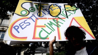 A man takes part in a demonstration against CETA in Paris. AFP
