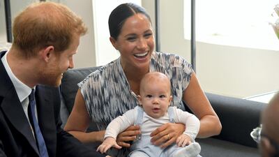 Prince Harry, Meghan, Duchess of Sussex and their baby son, Archie Mountbatten-Windsor, meet Archbishop Desmond Tutu on September 25, 2019 in Cape Town, South Africa. Getty Images