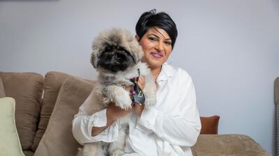 Paulita Hesketh, co-founder of the professional sitting service, The Pet Sitter, with her two-year-old Shih Tzu Mizuki. Antonie Robertson / The National