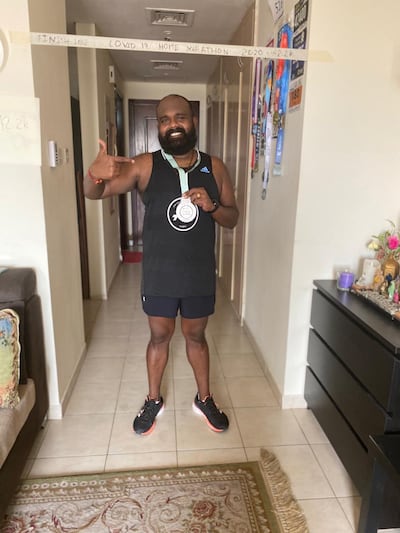Jai Arumugam ran around his studio apartment in Discovery Gardens to complete his third marathon this year. Courtesy Jai Arumugam