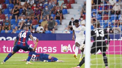 Vinicius scores Real's third goal. AP