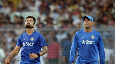 While Pakistani players are unable to play in the Indian Super League, PSL chiefs have invited Indian players, such as Virat Kohli, left, and MS Dhoni, right, to play in the UAE-hosted tournament. Dibyangshu Sarkar / AFP