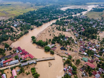 A bridge damaged by flash floods on the main road connecting Aceh and North Sumatra in Meureudu, Indonesia. AFP