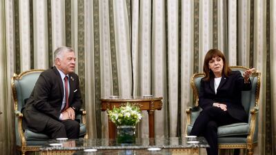 King Abdullah II of Jordan talks to Greek President Katerina Sakellaropoulou during their meeting in Athens, Greece.