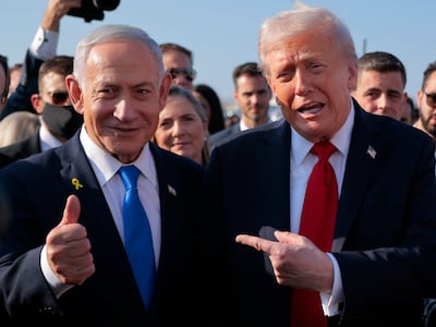 US President Donald Trump, right, and Israeli Prime Minister Benjamin Netanyahu at Ben Gurion International Airport in October 2025. Getty Images.