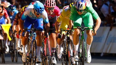 Jumbo-Visma's Wout Van Aert sprints to the finishing line. Reuters