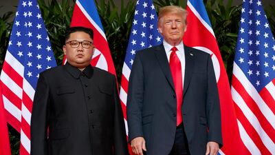 President Donald Trump, right, meets North Korean leader Kim Jong-un on Sentosa Island in Singapore in 2018. AP