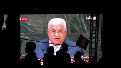Palestinians watch a broadcast showing a speech by Palestinian President Mahmoud Abbas at the U.N. General Assembly shown on TV in the West Bank city of Nablus. Reuters