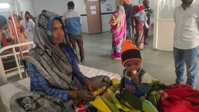 The infant emerged unscathed and has been hospitalised. Her condition is stable.