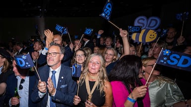 Supporters listen to far-right Sweden Democrats leader Jimmie Akesson deliver a speech at the party's election watch event in Solna, near Stockholm. AFP