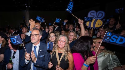 Supporters listen to far-right Sweden Democrats leader Jimmie Akesson deliver a speech at the party's election watch event in Solna, near Stockholm. AFP
