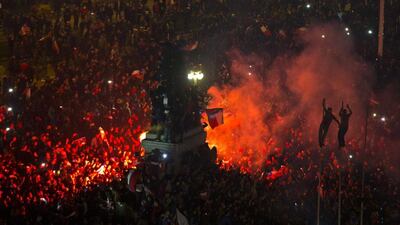 Fans of Chile celebrate after the victory. (AP Photo/Esteban Felix)