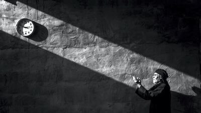 Photo by Abdel Aziz Mohammad Al Baqshi of a man in prayer in Iraq. Courtesy National Geographic Abu Dhabi