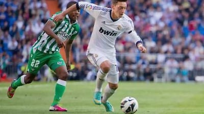 Mesut Ozil plays for Real Madrid but had started his career with Schalke, arch rivals to Madrid's hosts for the semi-finals tonight, Dortmund. Gonzalo Moreno / Getty Images