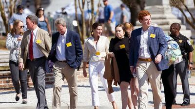 From left, Randy Murdaugh; John Marvin Murdaugh; his wife, Liz Murdaugh; Brooklynn White; and Buster Murdaugh leave the courthouse. AP