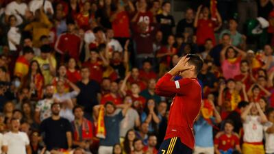 Alvaro Morata reacts after he misses a chance to score. Reuters