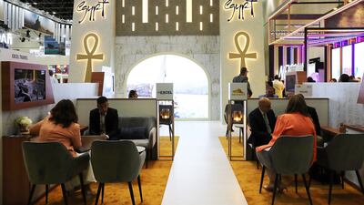 Visitors at the Egypt stand at the Arabian Travel Market 2024 at Dubai World Trade Centre. Pawan Singh / The National