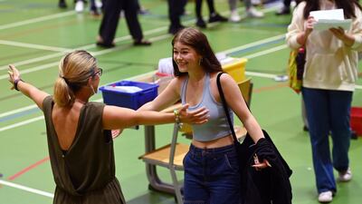 According to news reports, GCSE pass grades were down from last year but higher than pre-pandemic results. EPA