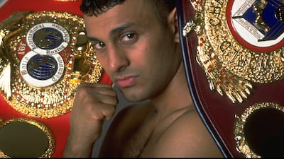 A portrait of Prince Naseem Hamed taken in 1997 with the IBF and WBO featherweight belts. John Gichigi/Allsport