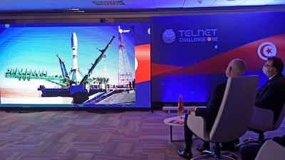 Tunisian President Kais Saied alongside Telnet CEO Mohamed Frikha attend the launch of Tunisia's first satellite Challenge-1, which was created by the Telnet telecommunications group, in Tunis. AFP