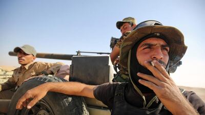 Shiite fighters from the Hashed Al Shaabi, or Popular Mobilization Forces, arrive at an area south of Mosul on October 22, 2016. Ahmad Al Rubaye/AFP