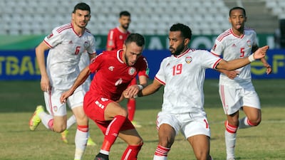 Lebanon's Abbas Assi turns away from Tahnoon Al Zaabi of UAE. AFP