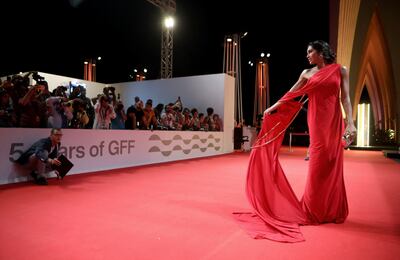 Egyptian actress, TV host and influencer Enjy Kiwan, poses on the red carpet at the 2021 El Gouna Film Festival. AFP