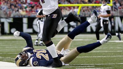 Baltimore Ravens wide receiver Anquan Boldin, top, steps out of bounds after catching a pass for a 15-yard gain as St. Louis Rams safety Darian Stewart, bottom, defends during the first quarter of an NFL football game, Sunday, Sept. 25, 2011, in St. Louis. (AP Photo/Jeff Roberson) *** Local Caption *** Ravens Rams Football.JPEG-0e556.jpg