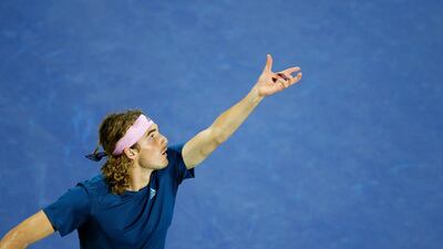 Tsitsipas prepares to serve. EPA
