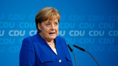 Angela Merkel speaks to the media after a meeting with Horst Seehofer, German interior minister and leader of the Bavarian Social Union. Carsten Koall/Getty Images