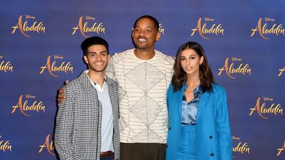 Massoud, Smith and Scott pose at the photo call for the film at The Rosewood Hotel in London. Getty Images.